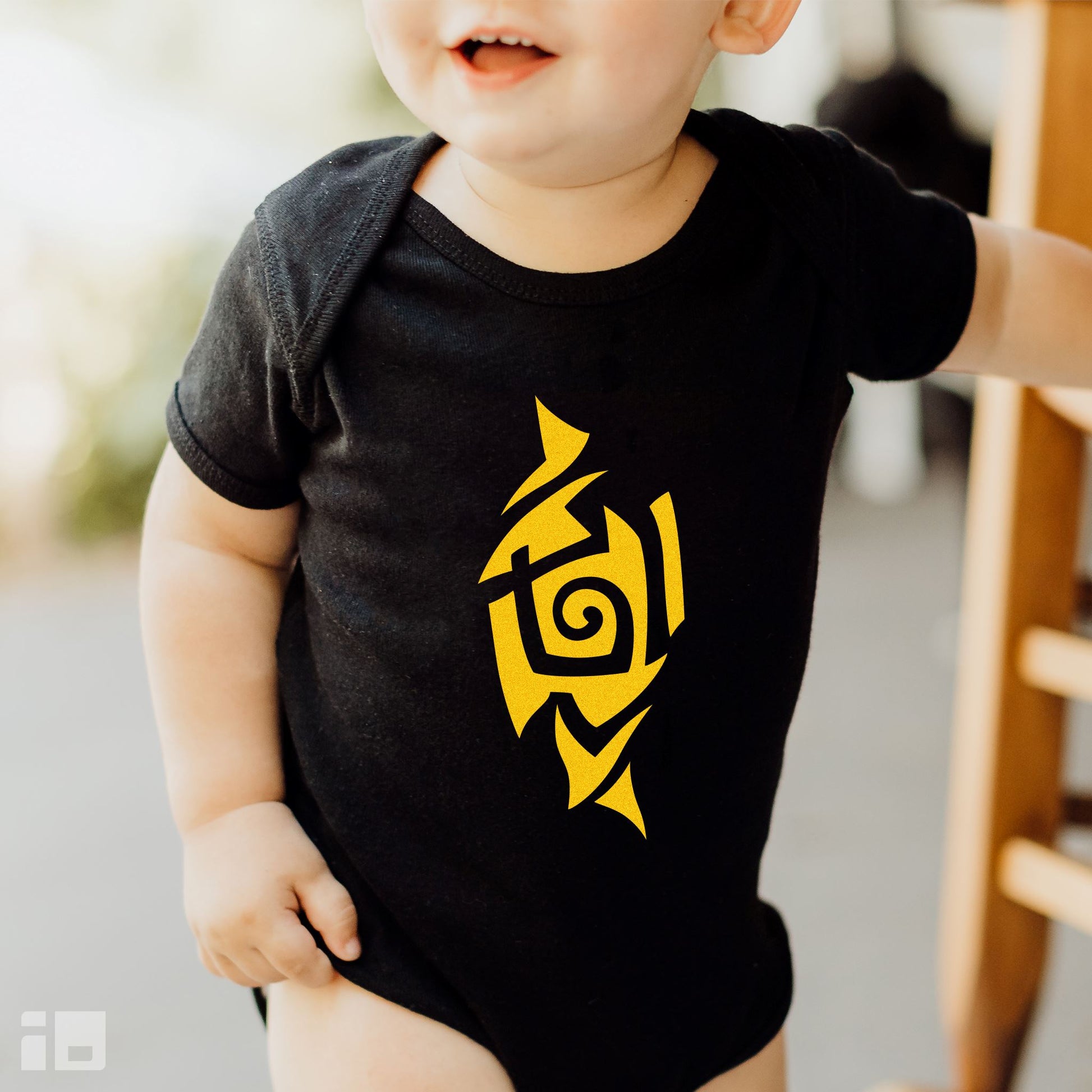 Caution Yellow Tribal Tattoo Baby Onesie™ Kids clothes Printify NB (0-3M) Black 